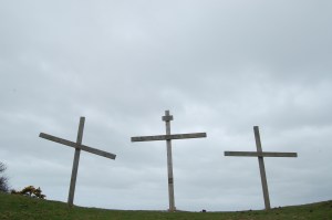 The Three Crosses at Lee Abbey set against a background of sky